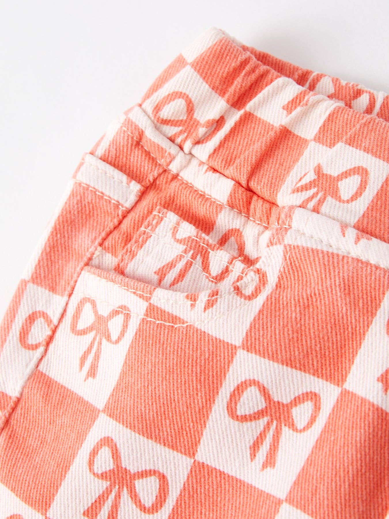 orange-bow-plaid-flare-pants